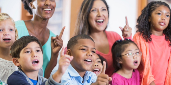 Elementary kids and teachers showing school spirit