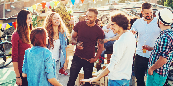 Organizing Community Socials with SignUp - group of neighbors on a rooftop at a community gathering